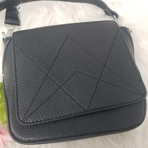 The Purse with a "C" tag inside. - Picture 10 of 10